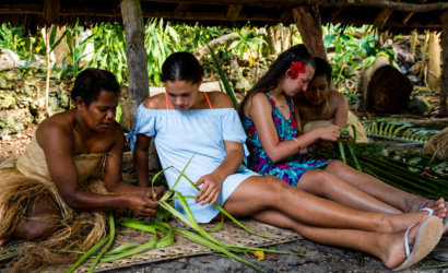 Ladies learning the traditional way of weaving